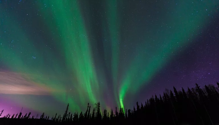 Aurora sky in Alaska with strong Northern Lights