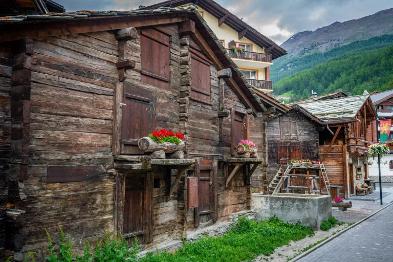 Ancient wooden traditional Swiss chalet a wooden house in old Hinterdorf quarter or rear village Zermatt Switzerland