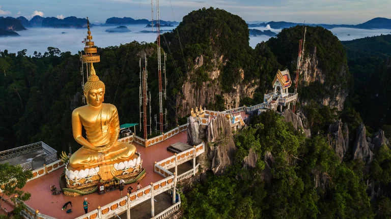 Buddha on the top Mountain of Wat Tham Seua (Tiger Cae) , Krabi,Thailand