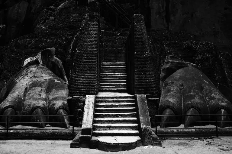 Explore the striking Lion's Paw stairway at Sigiriya, a renowned tourist destination in Sri Lanka.